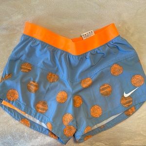 Nike dri-fit spandex shorts with loose layer over top